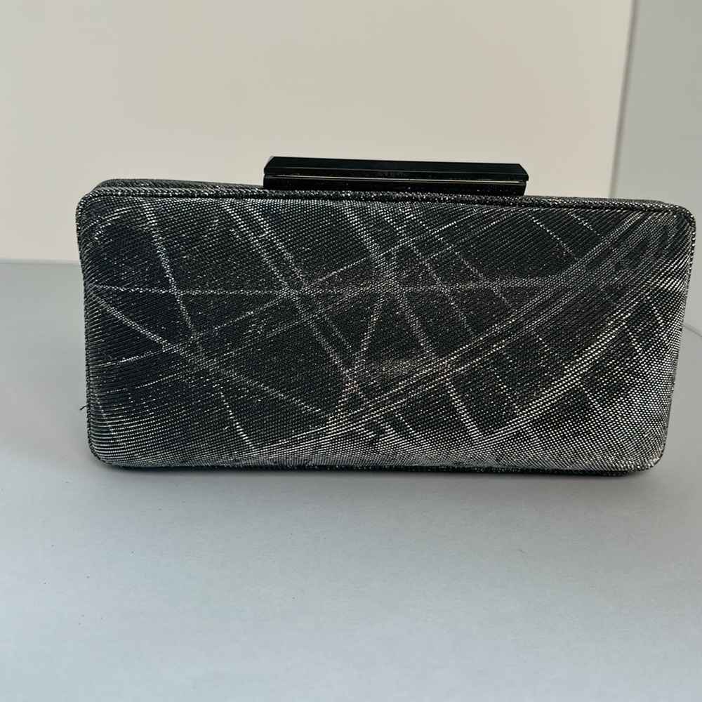Sondra Roberts Hard Case Convertible Clutch
Black/silver Metallic - Picture 5 of 6